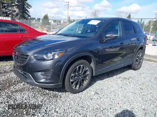 2016 Mazda CX-5 Grand Touring with VIN JM3KE4DY9G0895006, listed as a IAAI auction lot 41703146 with 39,359 mi miles. Bid and sale history available at carsss.com. Image 17.