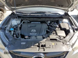 2014 Mazda CX-5 Sport with VIN JM3KE2BE7E0334880, listed as a Copart auction lot 61780635 with 96,926 mi miles and Salvage title. Bid and sale history available at DreamBid. Image 12.