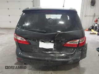 2014 Mazda 5 Sport z VIN JM1CW2BLXE0164748, wystawiony jako IAAI lot #42064606 z przebiegiem 140 169 mil mil oraz . Historia ofert i sprzedaży dostępna na DreamBid. Obrazek 16.