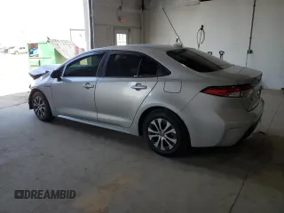 2021 Toyota Corolla Hybrid LE with VIN JTDEAMDE4MJ018825, listed as a Copart auction lot 50895965 with 93,988 mi miles and Salvage Title. Bid and sale history available at carsss.com. Image 2.
