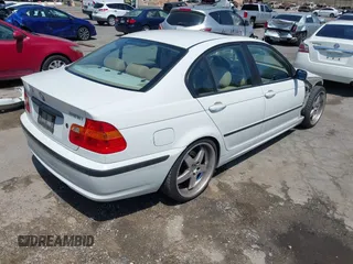 2004 BMW 3 Series 325i with VIN WBAAZ33484KP87894, listed as a IAAI auction lot 42131433 with 136,592 mi miles and . Bid and sale history available at carsss.com. Image 4.