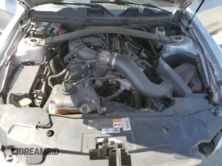 2012 Ford Mustang Premium z VIN 1ZVBP8AM7C5237576, wystawiony jako Copart lot #60374995 z przebiegiem 123 061 mil mil oraz Szkoda całkowita • Salvage title. Historia ofert i sprzedaży dostępna na DreamBid. Obrazek 11.