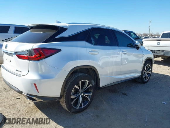 2018 Lexus RX 350 z VIN 2T2ZZMCAXJC106256, wystawiony jako IAAI lot #41658817 z przebiegiem 103 733 mil mil oraz . Historia ofert i sprzedaży dostępna na DreamBid. Obrazek 4.