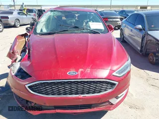 2017 Ford Fusion Titanium with VIN 3FA6P0K90HR184777, listed as a IAAI auction lot 41722188 with 116,654 mi miles. Bid and sale history available at carsss.com. Image 12.