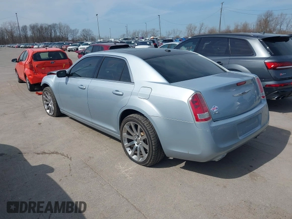2013 Chrysler 300 with VIN 2C3CCAGT9DH590053, listed as a IAAI auction lot 41800253 with 136,596 mi miles. Bid and sale history available at carsss.com. Image 3.