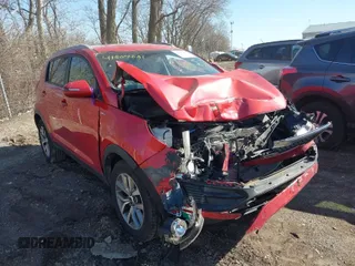 2015 Kia Sportage LX with VIN KNDPBCAC0F7740506, listed as a IAAI auction lot 41807081 with 104,428 mi miles and . Bid and sale history available at carsss.com. Image 1.