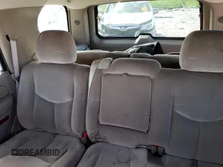 2004 GMC Yukon SLT with VIN 1GKEK13Z04J140148, listed as a Copart auction lot 52411494 with 167,629 mi miles and Salvage Title. Bid and sale history available at carsss.com. Image 10.
