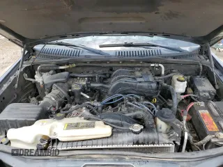 2010 Ford Explorer Sport Trac Limited z VIN 1FMEU3DE3AUA16121, wystawiony jako Copart lot #56853875 z przebiegiem 182 836 mil mil oraz Szkoda całkowita • Salvage title. Historia ofert i sprzedaży dostępna na DreamBid. Obrazek 11.