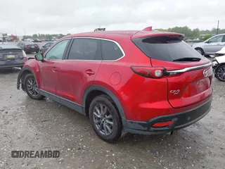 2022 Mazda CX-9 Touring with VIN JM3TCBCY9N0613508, listed as a IAAI auction lot 42258870 with 46,911 mi miles and . Bid and sale history available at DreamBid. Image 3.