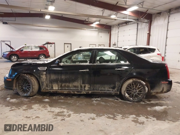 2010 Cadillac STS AWD with VIN 1G6DU6EV2A0125065, listed as a IAAI auction lot 41229886 with 84,954 mi miles and . Bid and sale history available at DreamBid. Image 15.