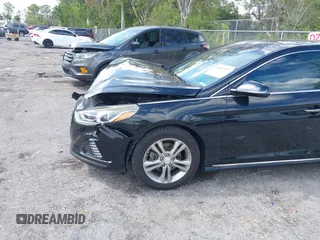 2018 Hyundai Sonata SEL with VIN 5NPE34AF3JH647018, listed as a IAAI auction lot 41687419 with 97,561 mi miles and . Bid and sale history available at DreamBid. Image 19.