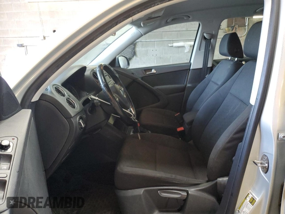 2013 Volkswagen Tiguan S with VIN WVGAV3AX9DW626065, listed as a Copart auction lot 58014145 with 128,858 mi miles and Salvage title. Bid and sale history available at DreamBid. Image 7.