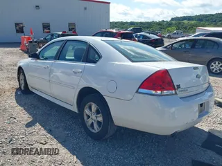 2014 Chevrolet Impala LS with VIN 2G1WA5E37E1189080, listed as a IAAI auction lot 42607058 with 128,337 mi miles and . Bid and sale history available at DreamBid. Image 3.