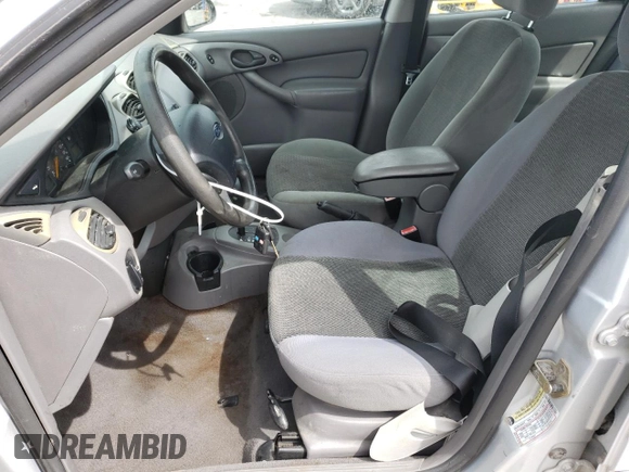 2004 Ford Focus SE with VIN 1FAFP34344W113759, listed as a Copart auction lot 51386335 with 148,267 mi miles and Salvage title. Bid and sale history available at DreamBid. Image 7.