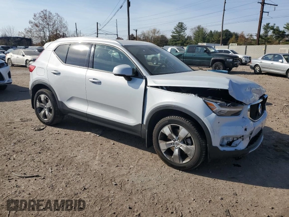 2022 Volvo XC40 Momentum with VIN YV4AC2HK2N2726416, listed as a Copart auction lot 77426764 with 84,997 mi miles and Salvage title. Bid and sale history available at DreamBid. Image 4.