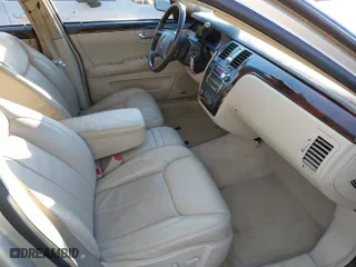 2009 Cadillac DTS w/1SA with VIN 1G6KD57Y69U110856, listed as a IAAI auction lot 41369392 with 89,282 mi miles. Bid and sale history available at carsss.com. Image 5.