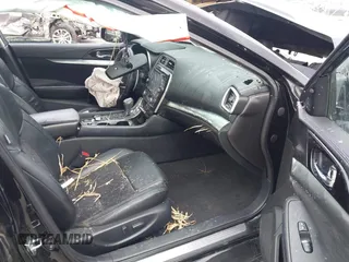 2016 Nissan Maxima SR z VIN 1N4AA6AP9GC386237, wystawiony jako IAAI lot #42166280 z przebiegiem 130 091 mil mil oraz . Historia ofert i sprzedaży dostępna na DreamBid. Obrazek 5.
