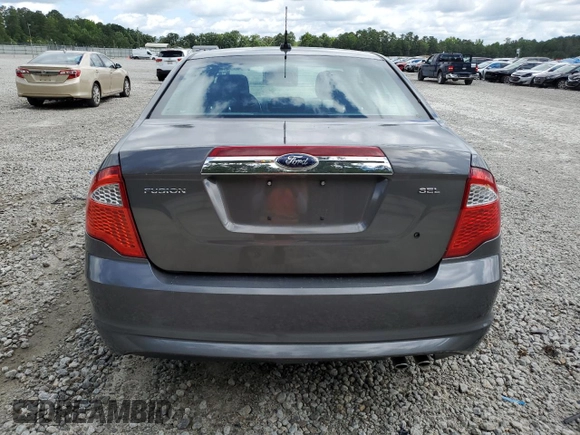 2012 Ford Fusion SEL with VIN 3FAHP0JA4CR292185, listed as a Copart auction lot 60916345 with 212,685 mi miles and Salvage title. Bid and sale history available at DreamBid. Image 6.