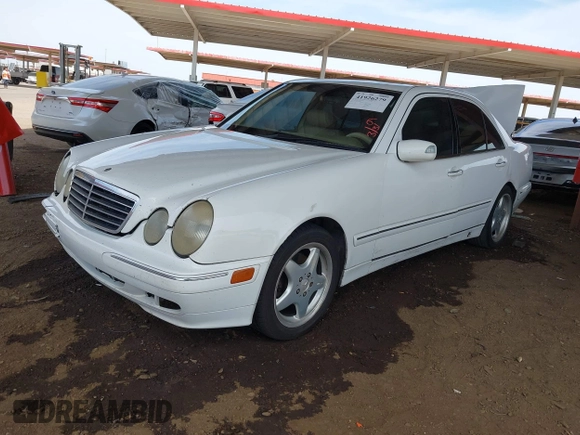 2001 Mercedes-Benz E-Class with VIN WDBJF65J61B183965, listed as a IAAI auction lot 41926279 with 305,436 mi miles. Bid and sale history available at carsss.com. Image 17.
