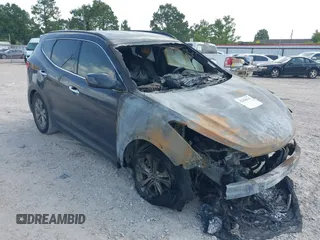 2014 Hyundai Santa Fe with VIN 5XYZU3LB0EG192628, listed as a IAAI auction lot 42420318 with Not provided miles and . Bid and sale history available at DreamBid. Image 1.