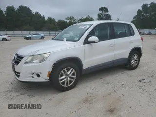 2011 Volkswagen Tiguan SE with VIN WVGBV7AX7BW560012, listed as a Copart auction lot 63031455 with 123,167 mi miles and Clean title. Bid and sale history available at DreamBid. Image 1.
