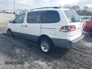2003 Toyota Sienna LE with VIN 4T3ZF13CX3U525214, listed as a IAAI auction lot 41750644 with 286,454 mi miles. Bid and sale history available at carsss.com. Image 3.