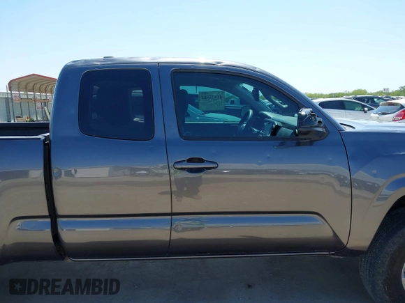 2020 Toyota Tacoma SR with VIN 3TYRX5GNXLT002488, listed as a IAAI auction lot 41973584 with 76,169 mi miles and . Bid and sale history available at DreamBid. Image 14.