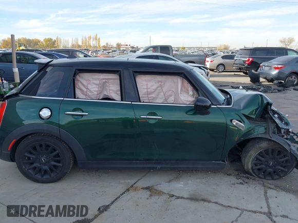 2016 MINI Cooper Hardtop 4 Door S with VIN WMWXU3C58G2D28227, listed as a IAAI auction lot 38046281 with 56,694 mi miles. Bid and sale history available at carsss.com. Image 14.