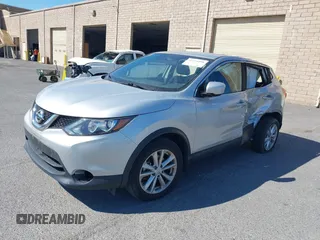 2017 Nissan Rogue SV with VIN JN1BJ1CP7HW017295, listed as a IAAI auction lot 42321408 with 84,430 mi miles and . Bid and sale history available at DreamBid. Image 17.