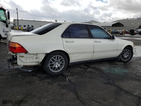 2001 Acura RL w/Navigation System with VIN JH4KA96671C001294, listed as a Copart auction lot 48045935 with 211,930 mi miles and Salvage Title. Bid and sale history available at carsss.com. Image 3.