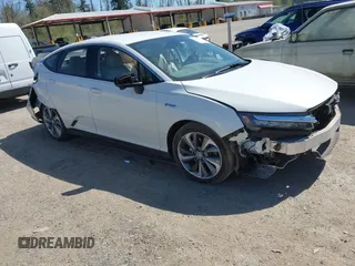2019 Honda Clarity with VIN JHMZC5F1XKC007033, listed as a IAAI auction lot 42064611 with 28,458 mi miles. Bid and sale history available at carsss.com. Image 1.