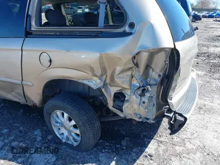 2002 Chrysler Town & Country EX with VIN 2C8GP74LX2R573857, listed as a IAAI auction lot 41846302 with Not Provided miles and . Bid and sale history available at carsss.com. Image 6.