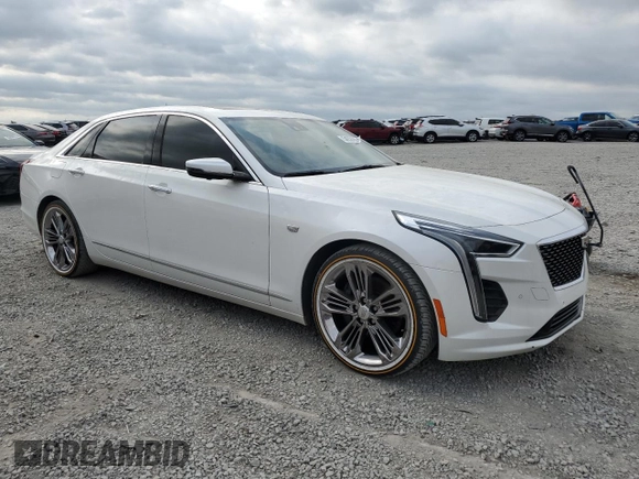 2019 Cadillac CT6 Luxury AWD with VIN 1G6KB5RS7KU123104, listed as a Copart auction lot 54058065 with 75,921 mi miles and Salvage title. Bid and sale history available at DreamBid. Image 4.
