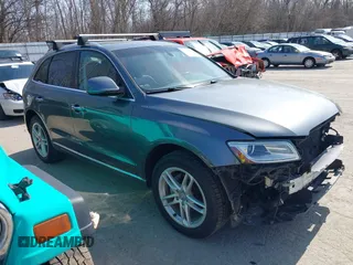2016 Audi Q5 Premium Plus with VIN WA1L2AFP0GA008793, listed as a IAAI auction lot 41779636 with 157,442 mi miles. Bid and sale history available at carsss.com. Image 1.