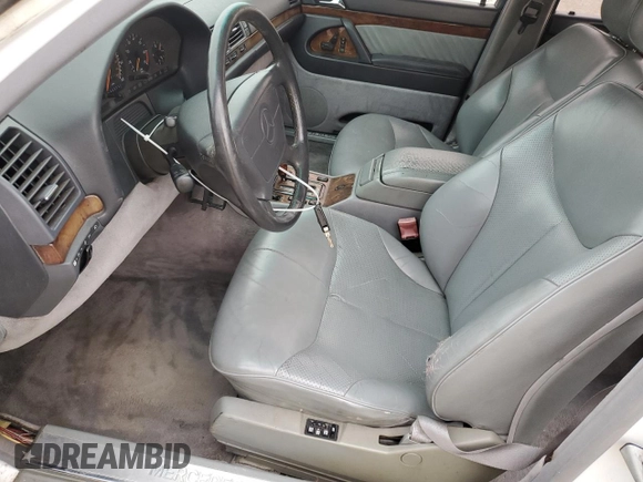 1992 Mercedes-Benz 560 with VIN WDBGA57E7NA068936, listed as a Copart auction lot 85746754 with 132,264 mi miles and Clean Title. Bid and sale history available at DreamBid. Image 7.
