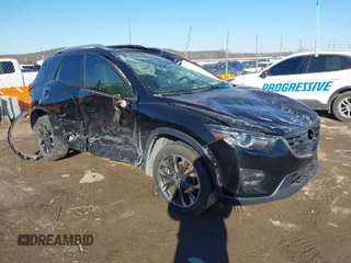 2016 Mazda CX-5 Grand Touring with VIN JM3KE4DY9G0837266, listed as a IAAI auction lot 41580670 with Not Provided miles and . Bid and sale history available at carsss.com. Image 1.