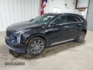 2021 Cadillac XT4 AWD Premium Luxury z VIN 1GYFZDR41MF001099, wystawiony jako Copart lot #48744655 z przebiegiem 57 633 mil mil oraz Tytuł czysty. Historia ofert i sprzedaży dostępna na DreamBid. Obrazek 1.