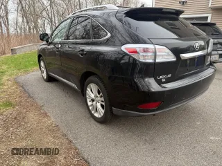 2010 Lexus RX 450h with VIN JTJBC1BA2A2412709, listed as a Copart auction lot 54962565 with 240,611 mi miles and Clean Title. Bid and sale history available at DreamBid. Image 3.