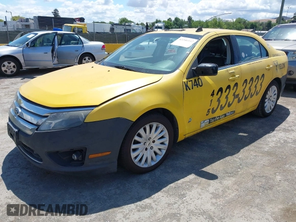 2012 Ford Fusion Hybrid with VIN 3FADP0L31CR284736, listed as a IAAI auction lot 42246142 with 384,612 mi miles and . Bid and sale history available at DreamBid. Image 2.