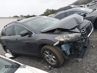 2013 Mazda CX-9 Touring with VIN JM3TB2CV6D0410888, listed as a IAAI auction lot 41688789 with 135,291 mi miles and . Bid and sale history available at carsss.com. Image 13.
