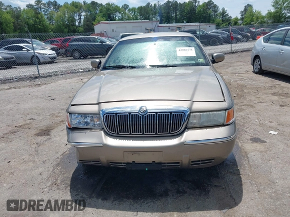 2001 Mercury Grand Marquis LS z VIN 2MEFM75W31X704182, wystawiony jako IAAI lot #42086175 z przebiegiem 177 892 mil mil oraz . Historia ofert i sprzedaży dostępna na DreamBid. Obrazek 12.