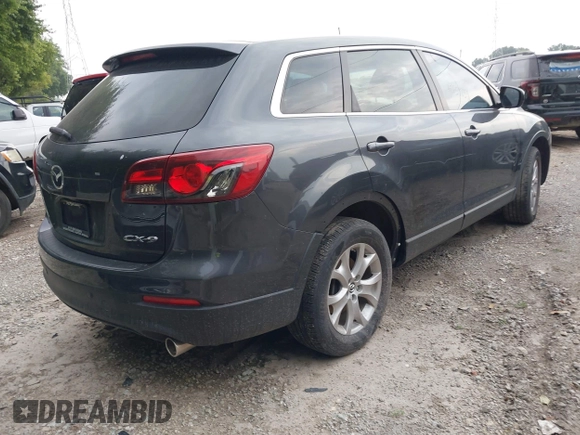 2015 Mazda CX-9 Touring with VIN JM3TB2CA5F0452775, listed as a IAAI auction lot 42659258 with 129,948 mi miles and . Bid and sale history available at DreamBid. Image 4.