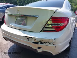 2014 Mercedes-Benz C 250 with VIN WDDGJ4HB9EG186697, listed as a IAAI auction lot 42447765 with 99,700 mi miles and . Bid and sale history available at DreamBid. Image 6.