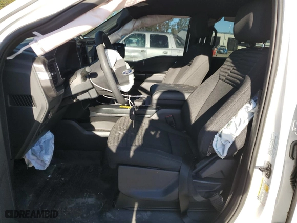 2023 Ford F-150 XL with VIN 1FTEW1C52PKD40847, listed as a Copart auction lot 76378694 with 12,741 mi miles and Salvage Title. Bid and sale history available at carsss.com. Image 7.