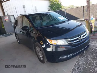 2014 Honda Odyssey EX-L with VIN 5FNRL5H60EB130907, listed as a IAAI auction lot 42605002 with 202,265 mi miles and . Bid and sale history available at DreamBid. Image 1.