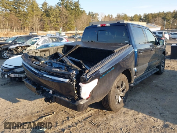 2023 Ford F-150 Lightning Pro with VIN 1FT6W1EV7PWG33511, listed as a IAAI auction lot 41761149 with 10,501 mi miles and . Bid and sale history available at DreamBid. Image 4.