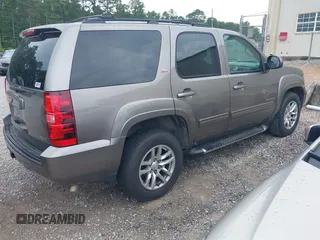 2011 Chevrolet Tahoe LT with VIN 1GNSCBE08BR163408, listed as a IAAI auction lot 42345398 with 283,718 mi miles and . Bid and sale history available at DreamBid. Image 4.
