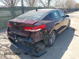 2019 Kia Optima LX with VIN 5XXGT4L37KG347930, listed as a IAAI auction lot 41772543 with 112,608 mi miles. Bid and sale history available at carsss.com. Image 4.