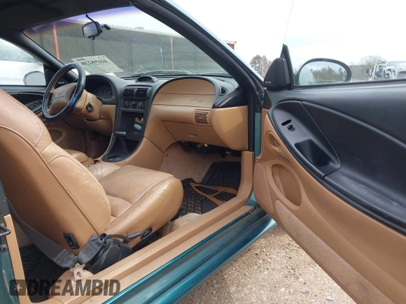 1996 Ford Mustang GT with VIN 1FALP45X7TF129303, listed as a IAAI auction lot 41698238 with 130,181 mi miles. Bid and sale history available at carsss.com. Image 5.