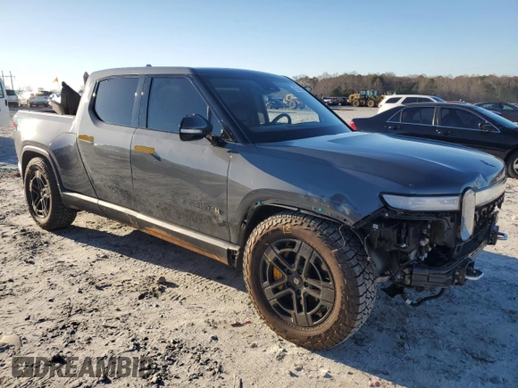 2023 Rivian R1T Adventure z VIN 7FCTGAAA1PN022134, wystawiony jako Copart lot #85545774 z przebiegiem 48 951 mil mil oraz Szkoda całkowita • Salvage title. Historia ofert i sprzedaży dostępna na DreamBid. Obrazek 4.